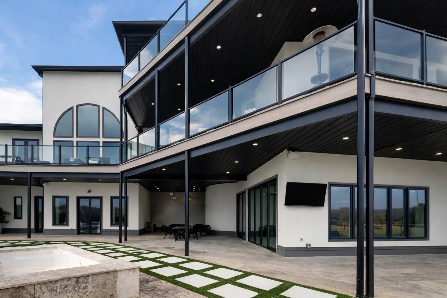 Modern home with painted underdeck soffit and dark fascia bands — Jonesborough